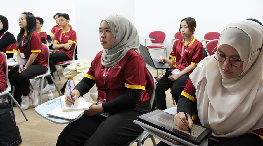 Nursing College Brunei | A group of dedicated JCHS students inside a classroom. They are focused on their studies as they work diligently toward their goals of completing the nursing programs offered at JCHS, serving as the foundation for their future rewarding nursing careers.